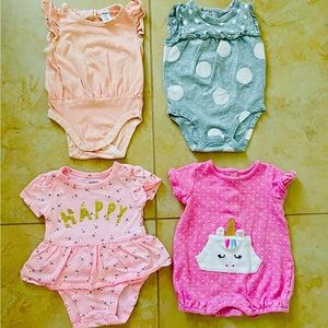 4 baby girl onesies  . Size 3 months .